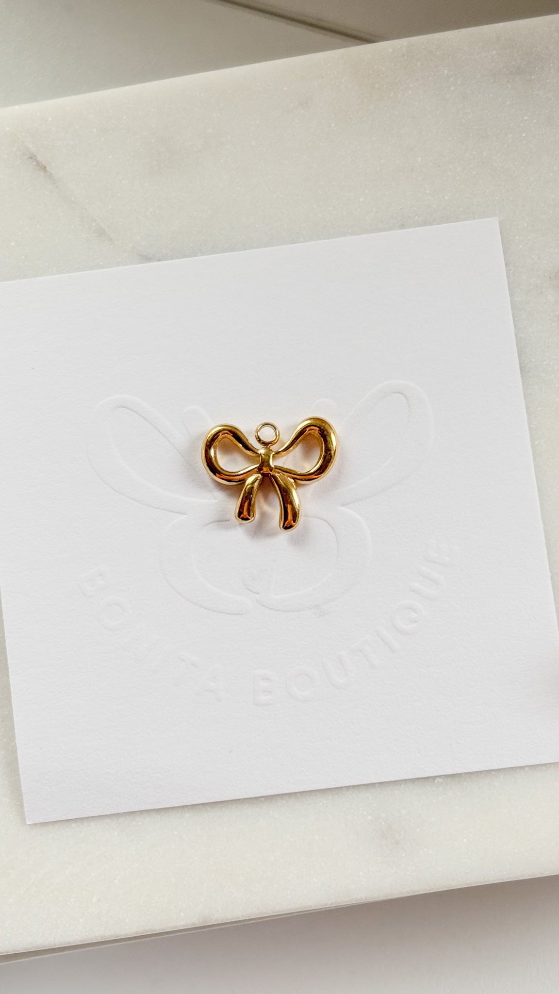 Open Bow Charm